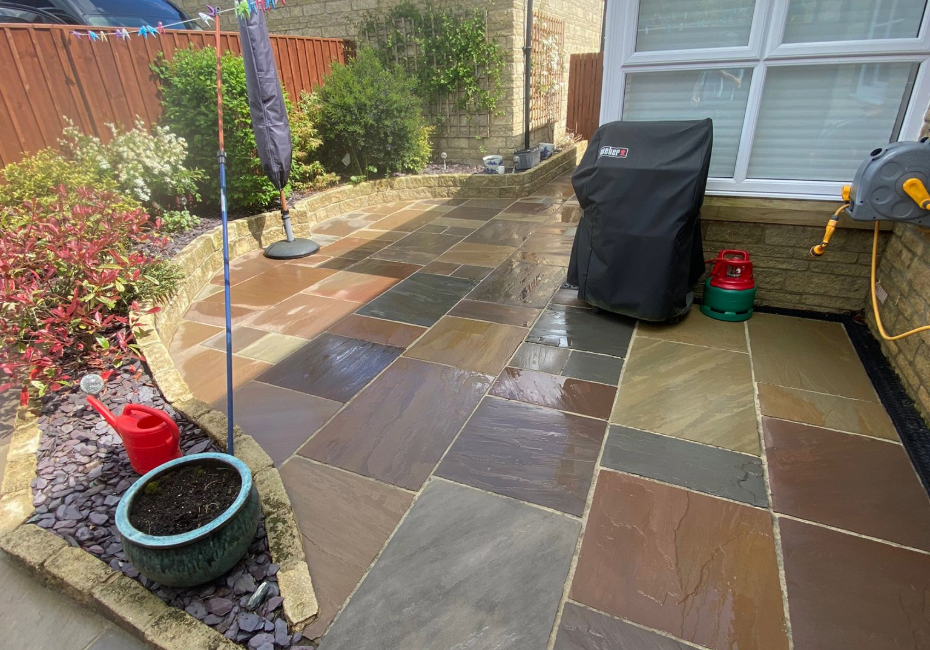 residential pressure washing services on a back garden patio