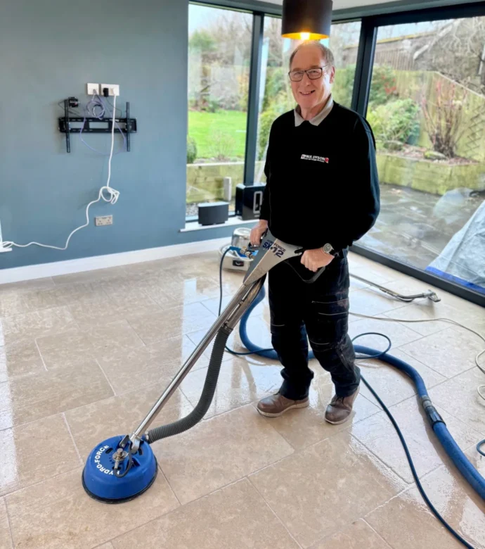 Paul Dyson restoring a natural stone floor.